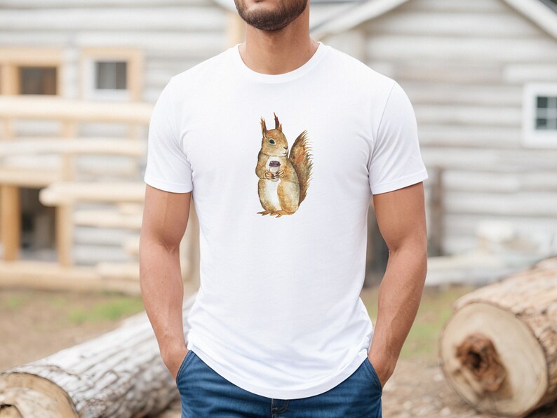 White colored tshirt featuring a fuzzy squirrel drinking a hot coffee.