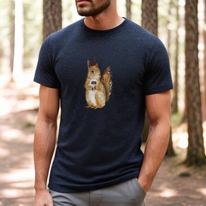 Heather Navy colored tshirt featuring a fuzzy squirrel drinking a hot coffee.