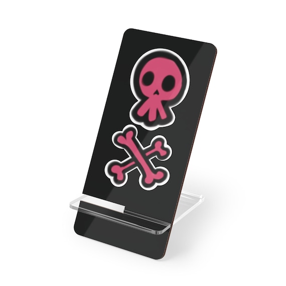 Phone Stand | Black and Pink Cartoon Skull and Crossbones | Pink Pastel Alternative Style | Rebel Edgy Girl