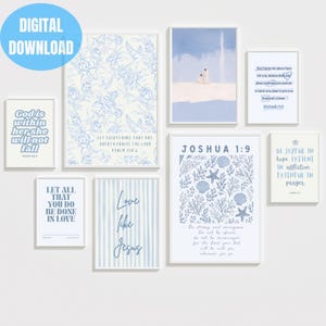 May include: A collection of eight wall art prints featuring blue and white colour schemes with various religious quotes and illustrations, including floral patterns, ocean motifs, and typography. The prints display text such as God is within her she will not fall, Let everything that has breath praise the Lord, Joshua 1:9, and Love like Jesus.