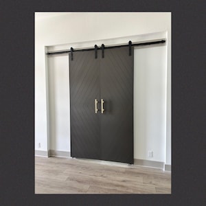 The “Chevron” - A custom barn door with a  rustic, modern style. Any size - Any colors