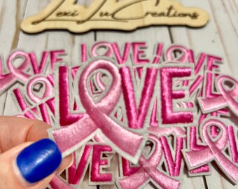 Parche de sombrero con lazo de amor contra el cáncer de mama