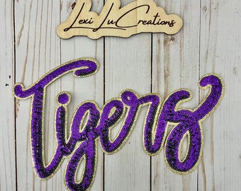 Toppa con tigre dorata e viola