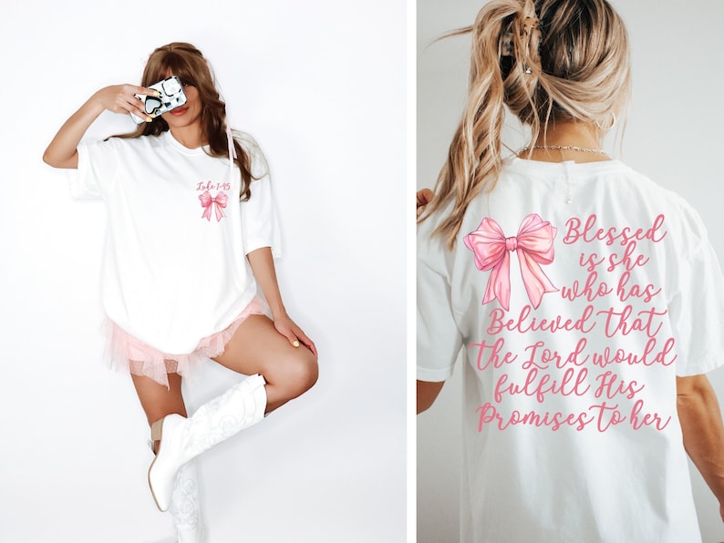 May include: White t-shirt with a pink bow and the text "Joel 1:15" on the front. The back of the shirt has a pink bow and the text "Blessed is she who has Believed that the Lord would fulfill His Promises to her".