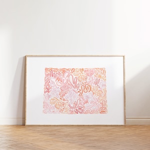 May include: A framed abstract art print with a white background and a colorful design of pink, orange, and yellow lines. The lines are arranged in a random pattern and create a sense of movement.