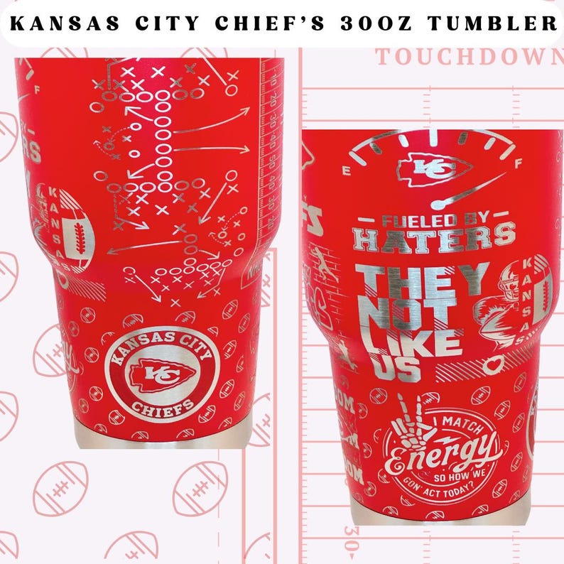 May include: A red 30 ounce tumbler featuring a Kansas City Chiefs logo and the words "Fueled by Haters They Not Like Us". The tumbler also has a football play diagram and the words "Touchdown" printed on it.