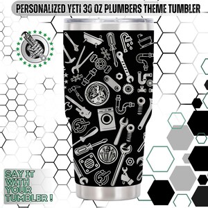 May include: A stainless steel 30 oz tumbler with a black background and a pattern of plumbing tools in white. The tumbler has the text "PERSONALIZED YETI 30 OZ PLUMBERS THEME TUMBLER" at the top and "SAY IT WITH YOUR TUMBLER!" at the bottom.