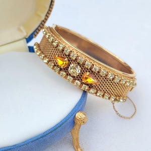 Vintage Yellow Rhinestone Gold Tone Metal Mesh Hinged Bangle Bracelet