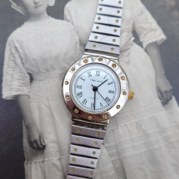 Vintage Oleg Cassini Ladies Silver tone Ladies Quartz Watch Adjustable