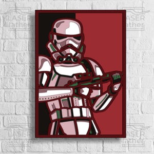 May include: A pink and white Stormtrooper from Star Wars with a green and red blaster rifle, against a red and black background.