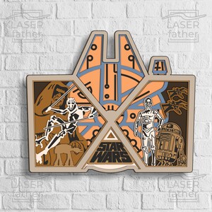 May include: A multi-layered wooden wall art featuring characters from Star Wars. The art includes a brown and tan background with a tan and blue spaceship in the center. The characters include a white figure with a lightsaber, a gold robot, and a smaller round robot. The text "Star Wars" is in the center of the art.