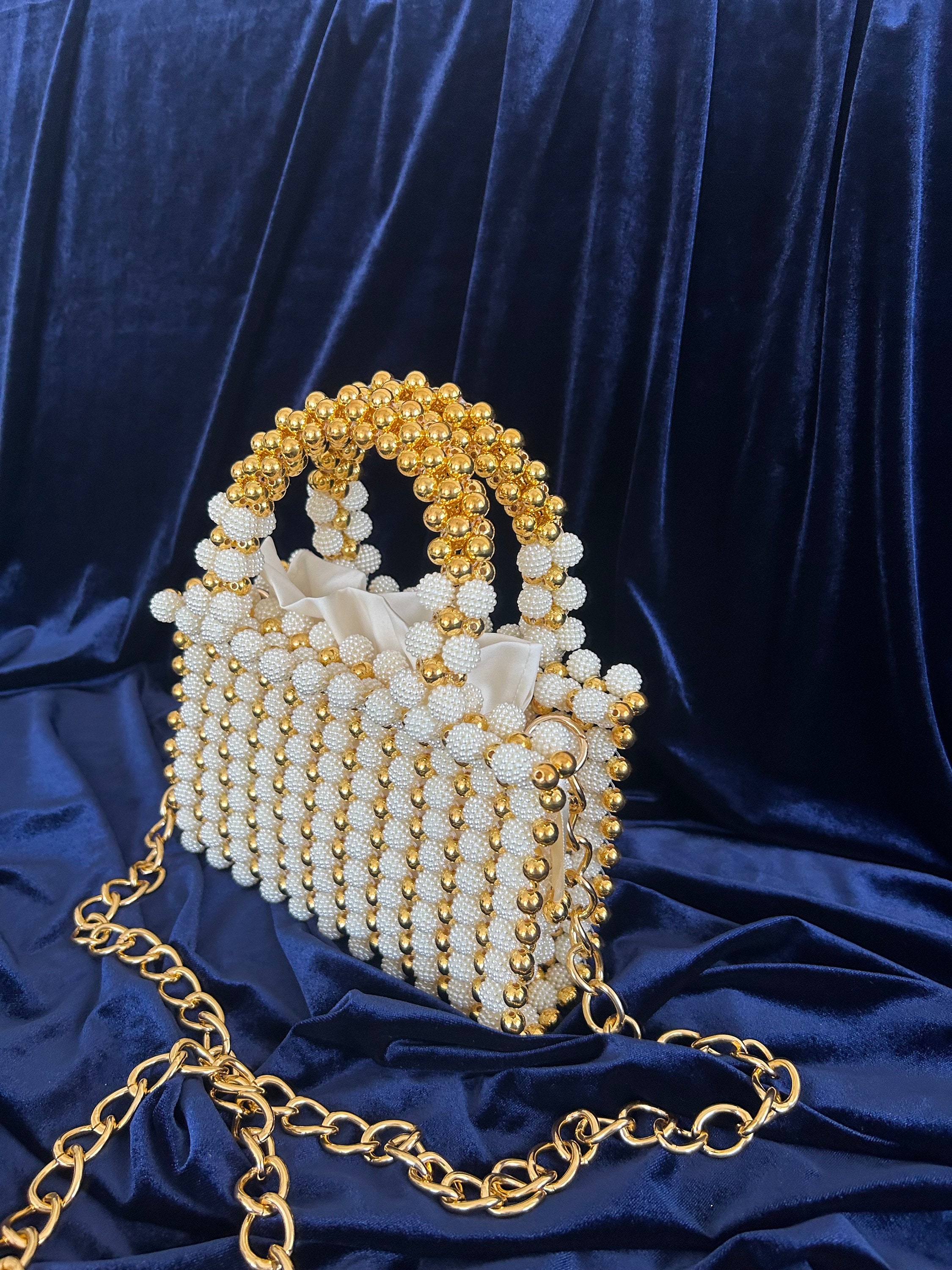 Pearl beaded clutch bag hotsell