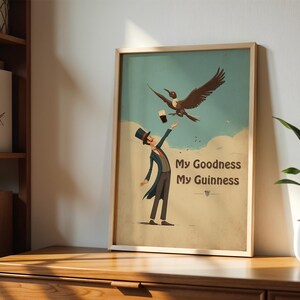 May include: A framed print with a vintage aesthetic, depicting a man in a top hat and tails reaching for a pint of Guinness, with a bird flying above. The text "My Goodness My Guinness" is displayed in a stylized font against a light blue and cream background.