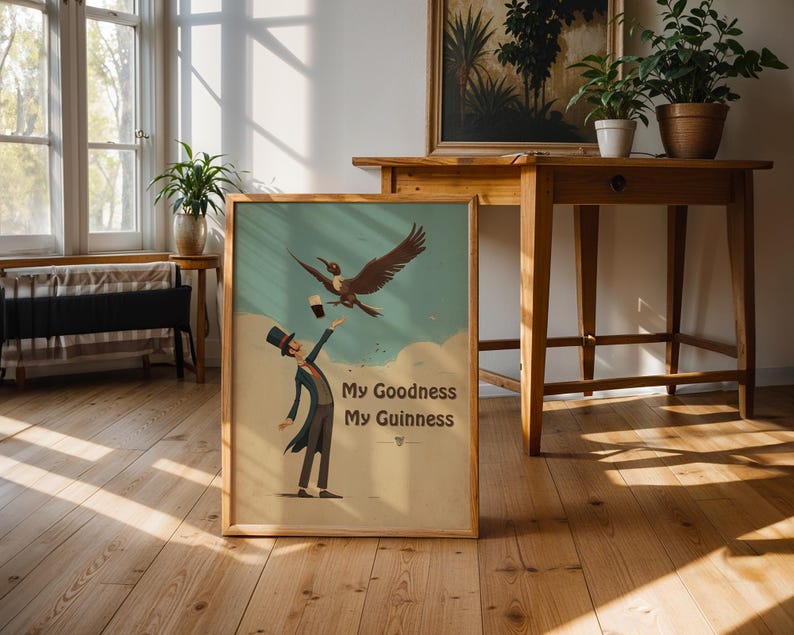 May include: A framed vintage poster featuring a cartoon illustration. It shows a man in a top hat and suit trying to catch a pint of stout from a bird. The poster has the text "My Goodness My Guinness" at the bottom.