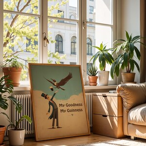 May include: A framed vintage poster with the text "My Goodness My Guinness" shows a cartoon illustration of a man in a top hat and a bird. The poster is displayed in a room with plants and a window.
