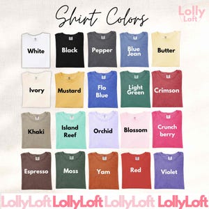 May include: A color chart displaying twenty folded t-shirts arranged in a grid, each labeled with its color name: White, Black, Pepper, Blue Jean, Butter, Ivory, Mustard, Flo Blue, Light Green, Crimson, Khaki, Island Reef, Orchid, Blossom, Crunchberry, Espresso, Moss, Yam, Red, and Violet.