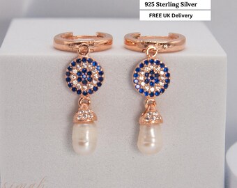 Roségouden boze oog-oorbellen: sterlingzilver, zirkonia en parel