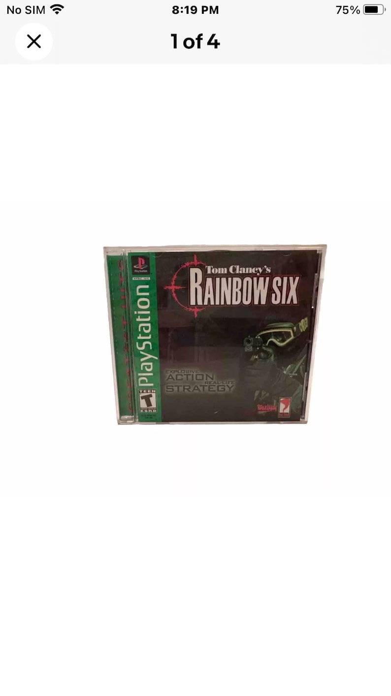 May include: A PlayStation game case for Tom Clancy's Rainbow Six. The case is green and black with a picture of a soldier wearing a gas mask and holding a gun. The text "Tom Clancy's Rainbow Six" is in white letters on a red background. The text "Explosive Action Real-Life Strategy" is in white letters on a black background.