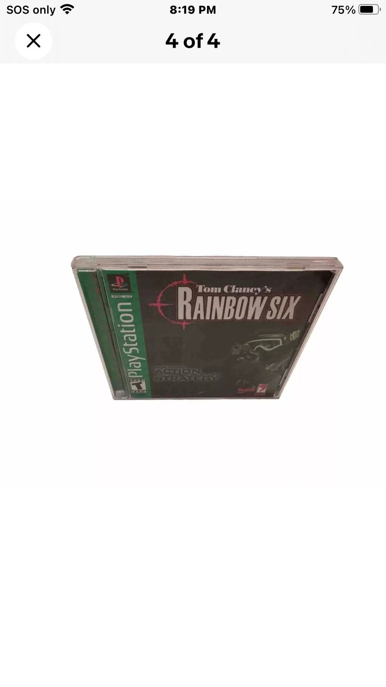 May include: A PlayStation game case for Tom Clancy's Rainbow Six. The case is black with a red and white target graphic and the game title in white text. The game is rated Teen by the ESRB.