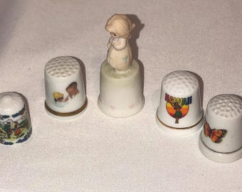 Five vintage ceramic thimbles Rockwell & Precious Moments Butterfly Plus