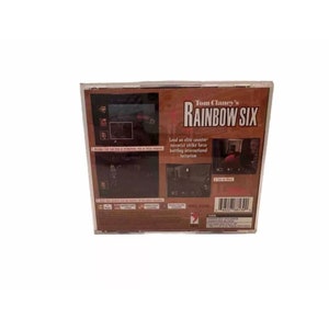 May include: A plastic case containing the video game Tom Clancy's Rainbow Six for the Playstation console. The back of the case features a brown background with the game's title in white text. The text "Lead an elite counter-terrorist strike force battling international terrorism" is also printed on the back of the case.