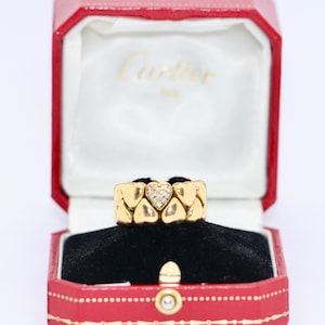 Anillo Cartier con banda Coeur de doble corazón, oro de 18 quilates con diamantes