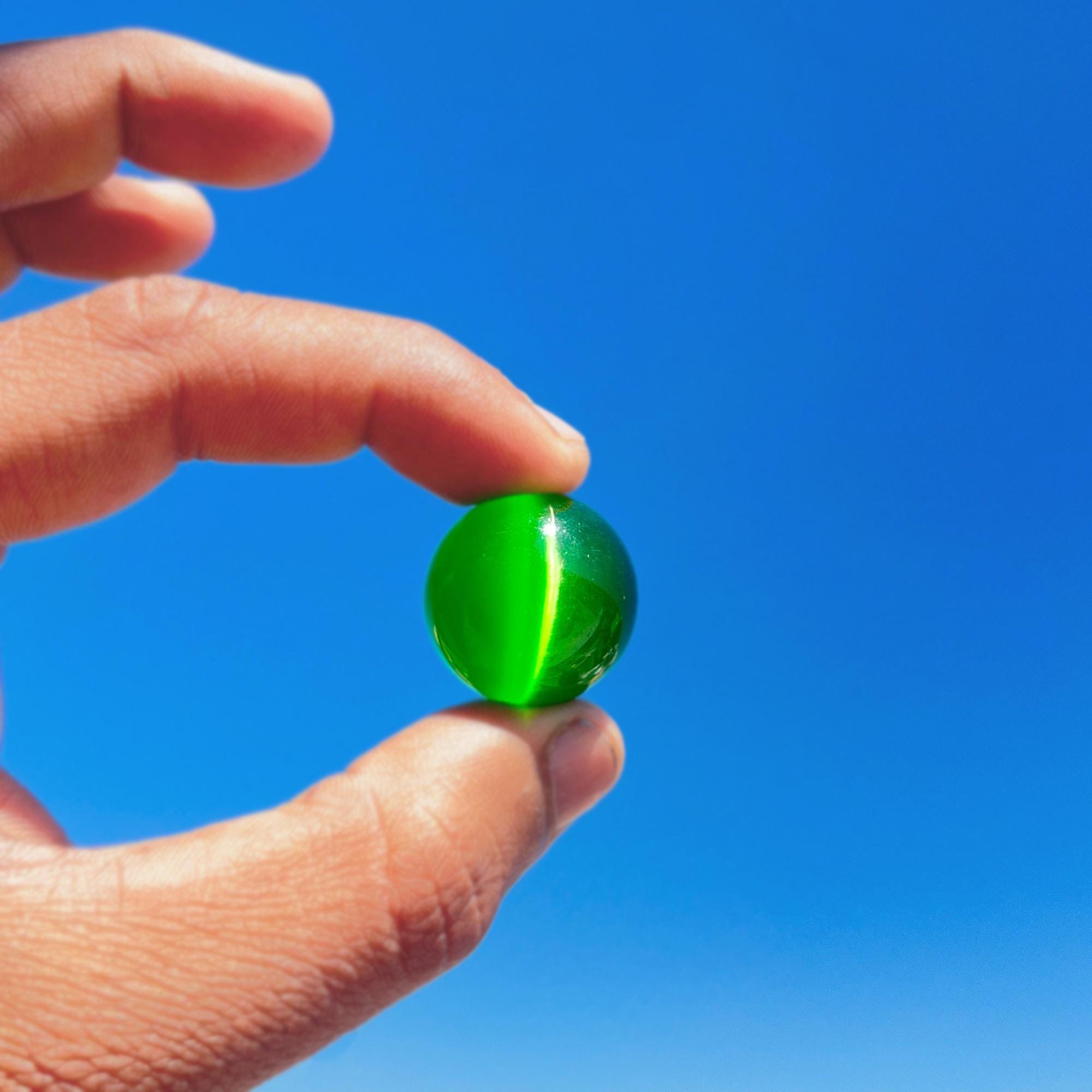 Green Cat's Eye Crystal Sphere: Polished Gemstone Home Decor