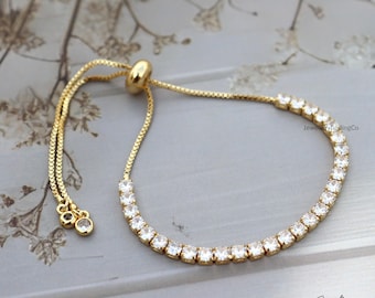 18k Vergoldetes Tennisarmband: Smaragdgrüner Cubic Zirkonia Slider