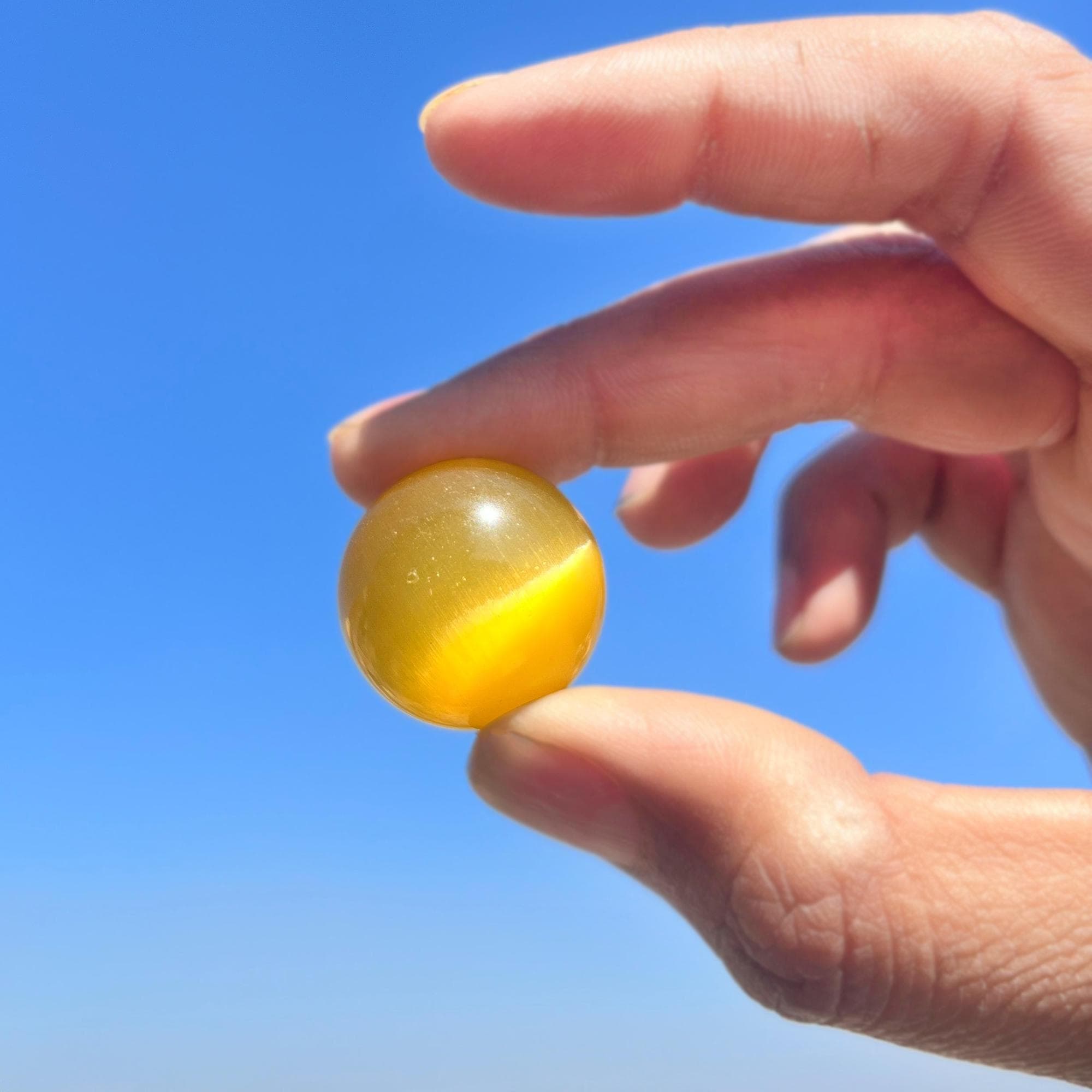 Yellow Cat's Eye Crystal Sphere: Polished Gemstone Healing Decor (25mm)