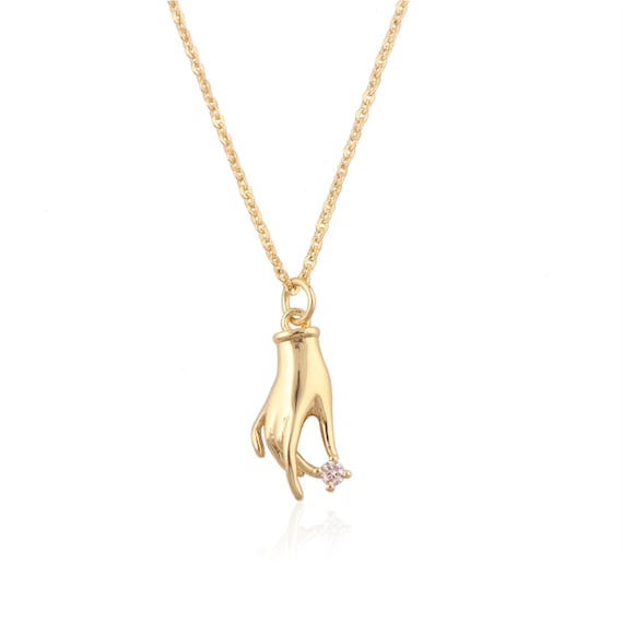 Collana con ciondolo a forma di fiore di rosa intagliato in