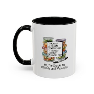 May include: White ceramic mug with a black handle and interior. The mug features a graphic of meal prep containers and a checklist. Text on the mug reads "Yes, The Snacks Are Off-Limits until Wednesday."