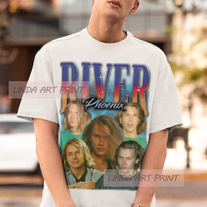 May include: White t-shirt with a vintage-style graphic of the band "River Phoenix". The graphic features a collage of photos of the band members.