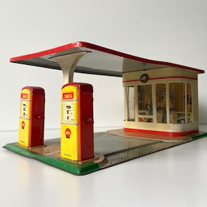Gasolinera Arnold Shell - Alemania Occidental - Juguetes de hojalata - Década de 1950 - D.P.A. - D.G.M. - Solicitudes de patentes extranjeras