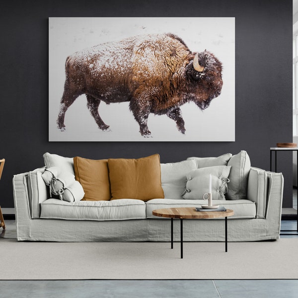 Large art canvas Big bison. Wall decor for home and office Buffalo trudges through the snow. Poster Wild animal outdoor. Nature