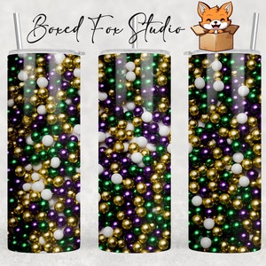 May include: Three stainless steel tumblers with a Mardi Gras theme. The tumblers are covered in a pattern of purple, green, and gold beads.