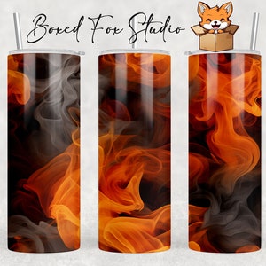 May include: A set of three 20 oz stainless steel tumblers with a design of orange and black flames. The tumblers are perfect for hot or cold beverages.
