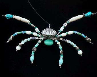 Hanging Beaded Spider Ornament: Turquoise, Silver and Carved Bone.