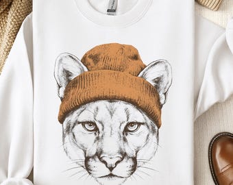 Cougar Wearing Beanie sweatshirt | Mountain Cat Illustration, Cozy Wildlife Apparel