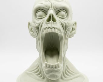 May include: A pale, off-white bust of a humanoid figure with a skeletal appearance, featuring deep-set eyes, prominent facial muscles, and an exaggerated, wide-open mouth revealing teeth, set upon a circular base with visible layer lines.