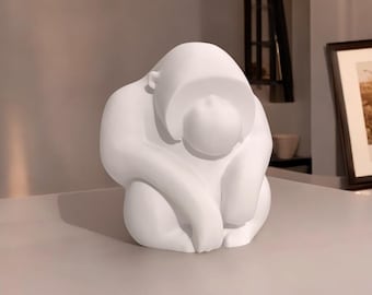 Thoughtful Orangutan Sculpture – Modern Emotional Art Piece