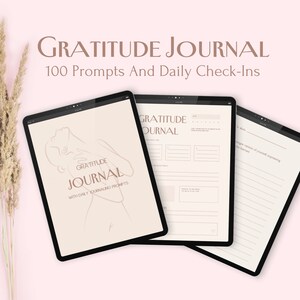 May include: Three digital tablet screens displaying a gratitude journal with 100 prompts and daily check-ins. The journal features a minimalist design with a line drawing of a woman on the cover.