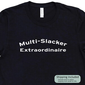 May include: Black t-shirt with white text that reads "Multi-Slacker Extraordinaire".