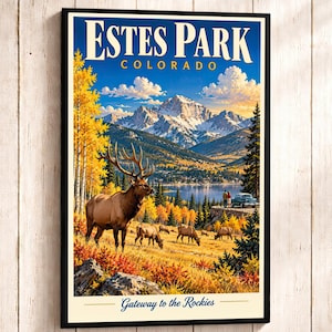 May include: A framed travel poster featuring the text ESTES PARK COLORADO and Gateway to the Rockies. The illustration depicts a large elk in the foreground, a herd of elk in a golden meadow, a blue lake, snow-capped mountains, and a car.