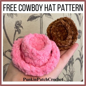 May include: Two crocheted cowboy hats, one pink and one brown, are held in a hand. The hats are made with a fuzzy yarn and have a simple, classic design. The text "FREE COWBOY HAT PATTERN" and "PunkinPatchCrochet" are visible in the image.