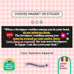 May include: A rectangular black magnet or sticker with a quote about treating foreigners with kindness. The text includes a heart, flowers, and the words "Choose Magnet or Sticker" at the top. The background is pink and white checkered.