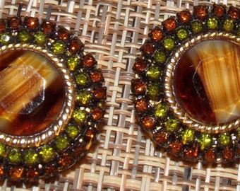 Outstanding earrings with jaw dropping stones signed HAR