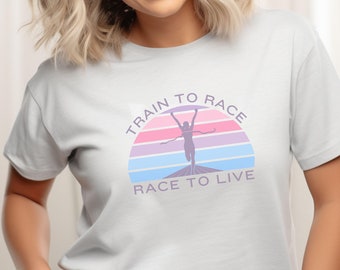May include: White t-shirt with a graphic of a runner crossing a finish line with the text "Train to Race, Race to Live".