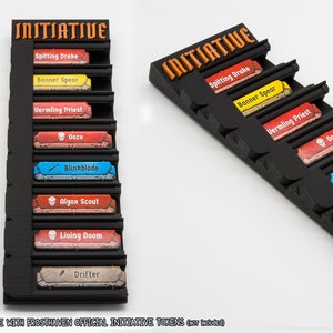 May include: A black plastic initiative tracker board with the word INITIATIVE embossed at the top. It features multiple horizontal slots holding rectangular game tokens labeled Spitting Drake, Banner Spear, Vermling Priest, Ooze, Blinkblade, Algox Scout, Living Doom, and Drifter.