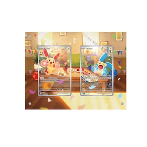 May include: Two Pokemon trading cards featuring Plusle and Minun. Plusle is yellow with red ears and cheeks, while Minun is blue with yellow accents. The cards are set against a colorful party scene with a table and decorations.