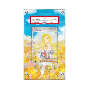 May include: A graded Pokémon trading card featuring a character illustration with a floral background. The card is encased in a clear holder with a red and white label at the top. The label includes text and a barcode.